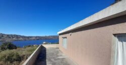 COD. 423 – HERMOSA CASA CON PILETA, VISTA AL LAGO SAN ROQUE Y A LAS SIERRAS EN VILLA PARQUE SIQUIMAN – CORDOBA.